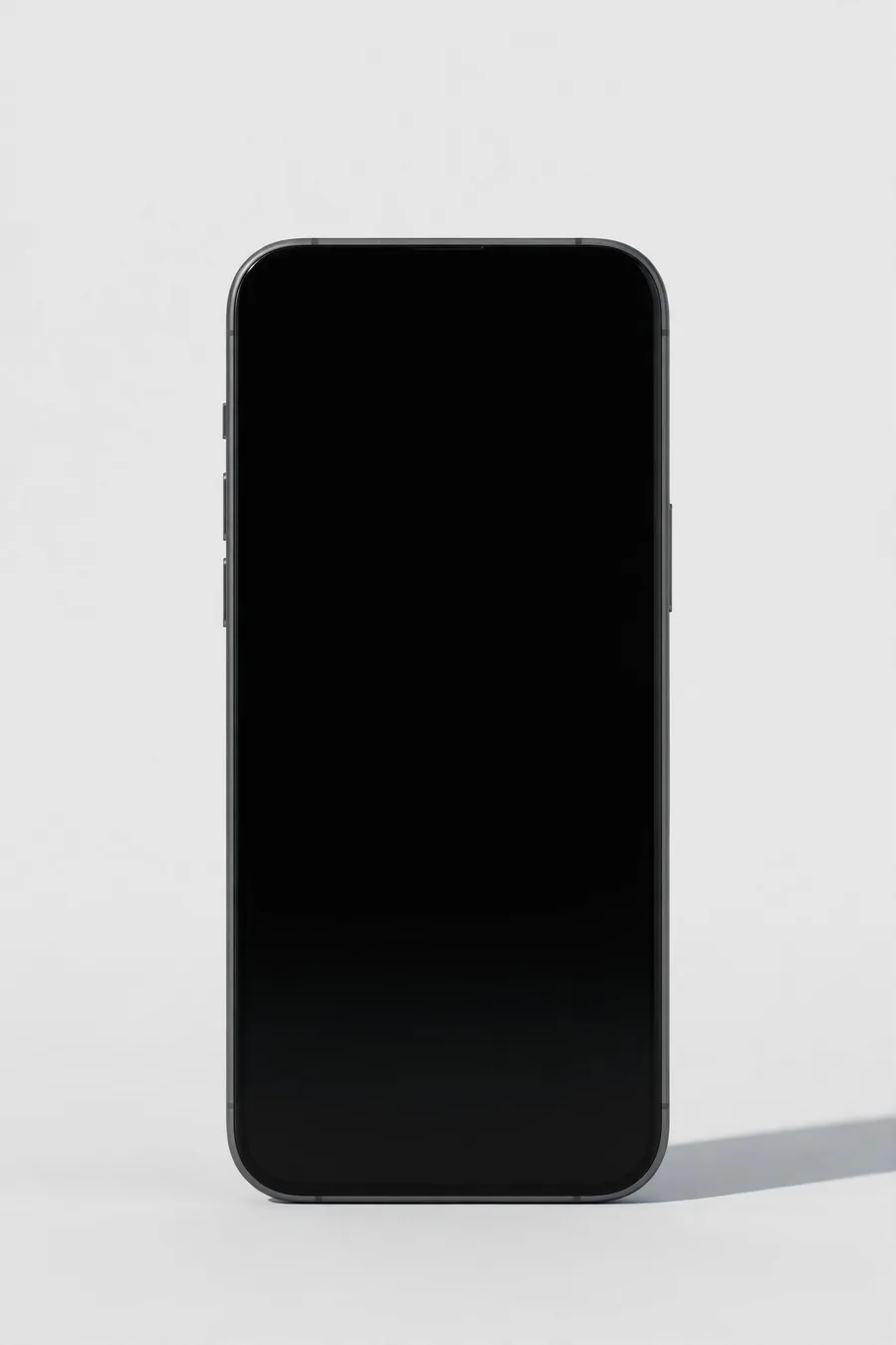 A dark smartphone standing on a light grey base